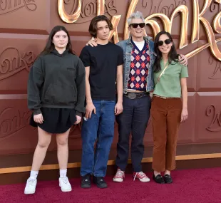 Arlo Clapp, Rocko Akira Clapp, Johnny Knoxville and Emily Ting attend the Los Angeles Premiere Of Warner Bros (Image via Getty)