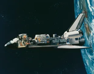Artist's impression showing a cutaway view of a NASA space shuttle carrying Spacelab, a modular reusable laboratory developed by European Space Agency (ESA), and the crew cabin, circa 1980. (Photo by Space Frontiers/Archive Photos/Getty Images)