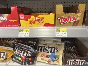 Candy aisle featuring Starburst, Twix, and M&M's on display at a store in San Francisco, California, May 8, 2025. (Photo by Smith Collection/Gado/Getty Images)