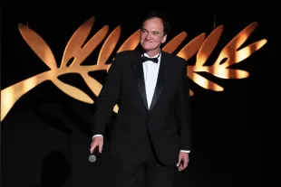 Quentin Tarantino walksonstage during the opening ceremony at the 78th annual Cannes Film Festival at the Palais de Festival on May 13, 2025 in Cannes, France. (Photo by Andreas Rentz/Getty Images)