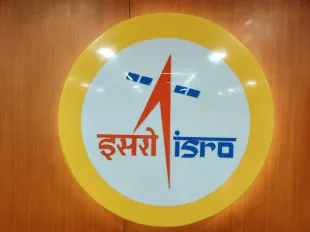 NEW DELHI, INDIA - MAY 17: The logo of ISRO or the Indian Space Research Organisation, Indias official space agency displayed on May 17, 2022 at the offices of the space agency in New Delhi. India has end to end capabilities in space, makes its own satellites, rockets and has satellites orbiting moon, mars and Earth. (Photo by Pallava Bagla/Corbis via Getty Images)