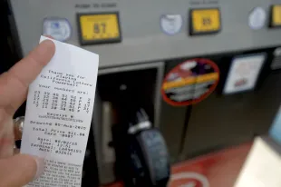 SANTA ANA, CA - AUGUST 03: A gas pump receipt shows lotto numbers purchased at the pump while buying gas at Edinger 76 in Santa Ana.The California Lottery's Powerball, SuperLotto and Mega Millions are now available at some gas pumps in Orange County including Edinger 76 in Santa Ana.///ADDITIONAL INFORMATION: Slug: fairyshrimp.1010.jag, Day: Monday, August 3, 2015 (8/3/15), Time: 1:52:44 PM, Location:  Santa Ana, California - Gas Pump Lotto  - JEFF GRITCHEN, STAFF PHOTOGRAPHER(Photo by Jeff Gritchen/Digital First Media/Orange County Register via Getty Images)