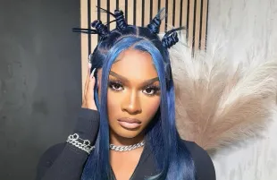 Girlalala posing for a picture (Image via Instagram/@_girlalalala)