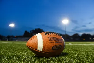A football on the sidelines before the start of the game. (Photo by Ben Hasty/MediaNews Group/Reading Eagle via Getty Images)