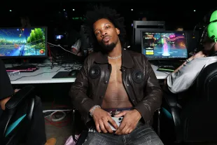 PARIS, FRANCE - MARCH 09: (EDITORIAL USE ONLY - For Non-Editorial use please seek approval from Fashion House) d4vd attends the Coperni Womenswear Fall/Winter 2025-2026 show as part of Paris Fashion Week  at Adidas Arena on March 09, 2025 in Paris, France. (Photo by Pascal Le Segretain/Getty Images)