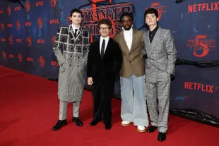 Actors Finn Wolfhard, Gaten Matarazzo, Caleb McLaughlin and Noah Schnapp attend the "Stranger Things" Season 5 Event at Hangar 7 - Flughafen Tempelhof on November 18, 2025 in Berlin, Germany. (Photo by Andreas Rentz/Getty Images for Netflix)