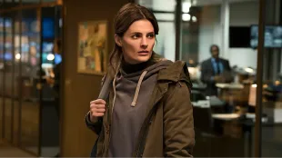 Stana Katic as Emily Byrne in Absentia, inside the FBI bullpen. (Image via Netflix)