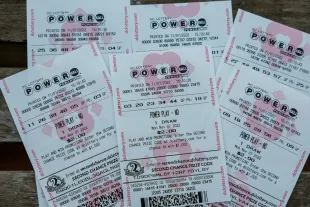 WASHINGTON, DC - NOVEMBER 07: In this photo illustration, tickets for the upcoming Powerball lottery are seen on November 07, 2022 in Washington, DC. The estimated Powerball jackpot for the November 7th drawing has increased to $1.9 billion, with an estimated lump sum payment of $929.1 million. (Photo illustration by Tasos Katopodis/Getty Images)