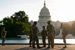 Members of the National Guard patrol near the U.S. Capitol on October 1, 2025 in Washington, DC. (Photo by Al Drago/Getty Images)