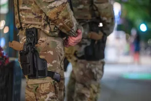 WASHINGTON, DC - AUGUST 24: National Guard Members patrol 14th street, working with Washington DC Metro police on August 24, 2025 in Washington, DC. An increased presence of law enforcement has been seen throughout the nation's capital since U.S. President Donald Trump ordered in federal officers and the U.S. National Guard. (Photo by Tasos Katopodis/Getty Images)
