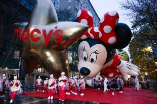 NEW YORK, NEW YORK - NOVEMBER 28: Revelers gather as rain falls before the Annual Thanksgiving Day Parade on November 28, 2024 in New York City. (Photo by Kena Betancur/Getty Images)