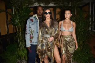 Kanye West,  Kim Kardashian and Kourtney Kardashian (Image Via Getty)