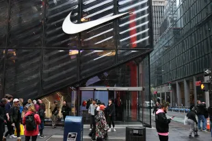 NEW YORK, NEW YORK - APRIL 03: A Nike store is seen on Fifth Avenue on April 03, 2025 in New York City. U.S. President Donald Trump declared a U.S. economic emergency and announced sweeping tariffs of at least 10%, with rates even higher for 60 countries or those that have a high trade deficit with the U.S. The tariffs will affect electronics, automobiles, clothing and shoes, wines and spirits, and Swiss watches.   (Photo by Michael M. Santiago/Getty Images)