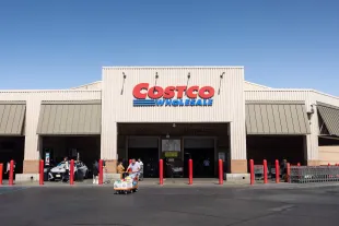 HAWTHORNE, CALIFORNIA - APRIL 04: A man with a flat cart full of groceries leaves a Costco warehouse on April 4, 2025, in Hawthorne, California. Costco Wholesale Corporation, one of the largest retailers in the world with nearly 900 stores worldwide, achieved about $250 billion in sales in 2024 and has been negotiating with suppliers to cut prices, to help offset President Trump's tariffs. (Photo by Jay L Clendenin/Getty Images)