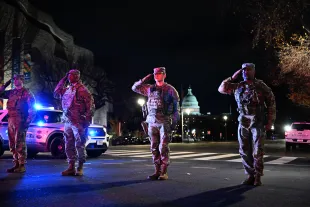 WASHINGTON, DC - NOVEMBER 27: Members of the National Guard stand in line near the Dwight D. Eisenhower Memorial during the dignified transfer of Spec. Sarah Beckstrom on Thursday, November 27, 2025 in Washington, DC. Beckstrom was one of the two National Guard members shot Wednesday near the White House. The second, Air Force Staff Sgt. Andrew Wolfe, 24, is critically wounded. (Photo by Marvin Joseph/The Washington Post via Getty Images)