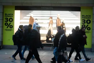 A general view of a Black Friday sign is seen in the city center of Frankfurt, Germany, on November 28, 2025. (Photo by Ying Tang/NurPhoto via Getty Images)
