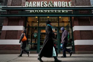 NEW YORK, NY - JANUARY 10: People walk by a Barnes & Noble bookstore, January 10, 2019 in the Brooklyn borough of New York City. On Thursday, Barnes & Noble Inc. cautioned investors that it could reduce its earnings guidance by up to 10 percent due to advertising spending and promotional activity. (Photo by Drew Angerer/Getty Images)
