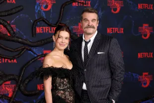 Millie Bobby Brown and David Harbour attend the Los Angeles Premiere of Netflix's "Stranger Things" Season 5 at TCL Chinese 6 Theatres on November 06, 2025 in Hollywood, California. (Photo by Kevin Winter/Getty Images)