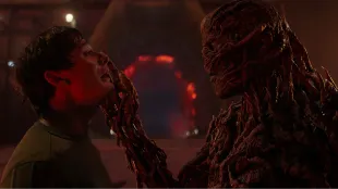 Vecna grips Will Byers in the Upside Down during Stranger Things season 5 Volume 1. Image via Netflix.