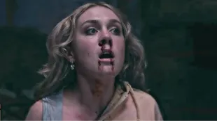 Gracie reels from the séance in Playing Gracie Darling. (Image via Paramount plus)