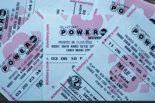 WASHINGTON, DC - NOVEMBER 07: In this photo illustration, tickets for the upcoming Powerball lottery are seen on November 07, 2022 in Washington, DC. The estimated Powerball jackpot for the November 7th drawing has increased to $1.9 billion, with an estimated lump sum payment of $929.1 million. (Photo illustration by Tasos Katopodis/Getty Images)