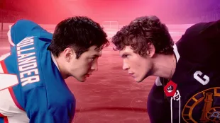 Shane Hollander and Ilya Rozanov face off at center ice in Heated Rivalry season 1, Image via Crave.