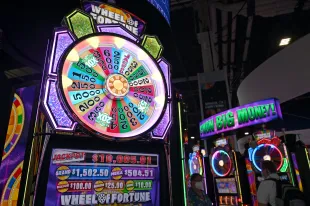 LAS VEGAS, NEVADA - OCTOBER 05: "Wheel of Fortune" slot machines are displayed at the IGT booth during the 2021 Global Gaming Expo at the Sands Expo and Convention Center on October 05, 2021 in Las Vegas, Nevada. (Photo by David Becker/Getty Images)
