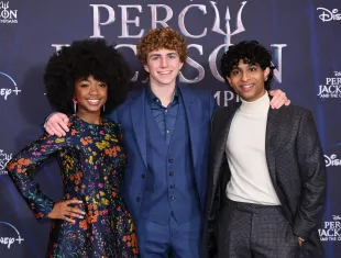LONDON, ENGLAND - DECEMBER 16: (L-R) Leah Sava Jeffries, Walker Scobell and Aryan Simhadri attend the UK premiere of "Percy Jackson And The Olympians" at Odeon Luxe Leicester Square on December 16, 2023 in London, England. (Photo by Karwai Tang/WireImage)