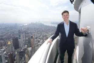 NEW YORK, NEW YORK - OCTOBER 03: Colin Jost lights the Empire State Building in Partnership with The New York Police and Fire Widows' and Children's Benefit Fund in Honor of Answer the Call Day at The Empire State Building on October 03, 2024 in New York City.  (Photo by John Nacion/Getty Images for Empire State Realty Trust)