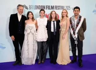 (L-R) Richard E. Grant, Felicity Jones, Emma Corrin, Director Julia Jackman, Maika Monroe and Amir El-Masry attend the "100 Nights of Hero" Closing Gala at the 69th BFI London Film Festival at The Royal Festival Hall on October 19, 2025 in London, England. (Photo by Karwai Tang/WireImage)