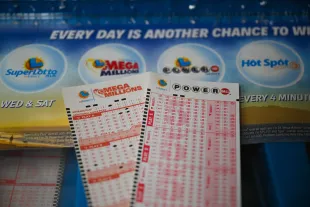 CALIFORNIA, USA - JULY 11: Lottery tickets are seen at a gas station as giant Powerball and Mega Millions jackpots grow more than $1B combined, in Trona, California, United States on July 11, 2023. (Photo by Tayfun Coskun/Anadolu Agency via Getty Images)