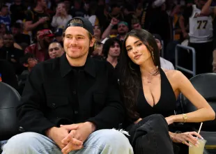 LOS ANGELES, CALIFORNIA - OCTOBER 24: Quarterback Justin Herbert #10 of the Los Angeles Chargers and Madison Beer attend a basketball game between Los Angeles Lakers and Minnesota Timberwolves at Crypto.com Arena on October 24, 2025 in Los Angeles, California. NOTE TO USER: User expressly acknowledges and agrees that, by downloading and/or using this Photograph, user is consenting to the terms and conditions of the Getty Images License Agreement.(Photo by Kevork Djansezian/Getty Images)
