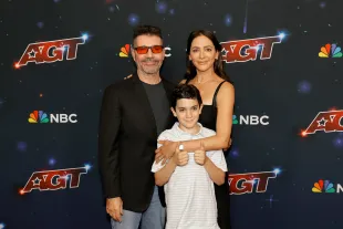 Simon Cowell and Lauren Silverman (Image via Getty)