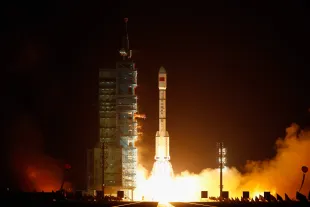 A Long March 2F rocket carrying the country's first space laboratory module Tiangong-1 lifts off from the Jiuquan Satellite Launch Center on September 29, 2011 in Jiuquan, Gansu province of China. The unmanned Tiangong-1 will stay in orbit for two years and dock with China's Shenzhou-8, -9 and -10 spacecraft with the eventual goal of establishing a manned Chinese space station around 2020 (Image via Getty)