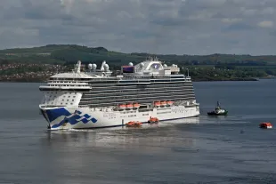 Princess Cruise Lines' ship MV Regal Princess lies beside the Forth Bridge as the cruising season around the UK gets into full swing, on May 17, 2023 in North Queensferry, Scotland.  (Photo by Ken Jack/Getty Images)