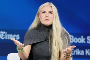 NEW YORK, NEW YORK - DECEMBER 03: C.E.O. and Chair of the Board of Turning Point USA Erika Kirk speaks onstage during the 2025 New York Times Dealbook Summit at Jazz at Lincoln Center on December 03, 2025 in New York City. NYT columnist Sorkin hosted the annual Dealbook summit which brings together business and government leaders to discuss the most important stories across business, politics and culture.  (Photo by Michael M. Santiago/Getty Images)