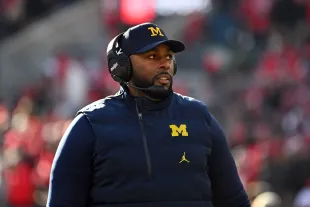COLUMBUS, OHIO - NOVEMBER 30: Head coach Sherrone Moore of the Michigan Wolverines stands during a timeout in the third quarter of a game against the Ohio State Buckeyes at Ohio Stadium on November 30, 2024 in Columbus, Ohio. (Photo by Ben Jackson/Getty Images)