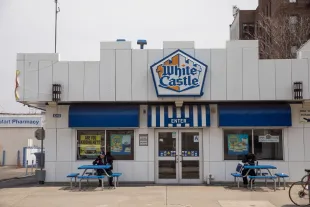 An exterior view of a White Castle restaurant, April 12, 2018 in the Queens borough of New York City. White Castle has introduced the meatless 'Impossible Slider' burger. The burger, which sell for $1.99, are about twice the size of White Castle's regular sliders. The patties, made primarily of wheat protein and potato, are the first plant-based burgers sold in an American quick-serve restaurant. (Photo by Drew Angerer/Getty Images)