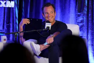 AMAGANSETT, NEW YORK - AUGUST 17: Will Arnett speaks onstage during SiriusXM Presents SmartLess Live with special guest Howard Stern at The Stephen Talkhouse on August 17, 2024 in Amagansett, New York.  (Photo by Cindy Ord/Getty Images for SiriusXM)