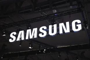 BARCELONA, SPAIN - JANUARY 30: A logo sits illuminated outside the Samsung booth at ISE 2024 on January 30, 2024 in Barcelona, Spain. This year the 20th edition of Integrated Systems Europe (ISE) is being held, the sixth in Barcelona. The hall occupies the entire surface of the Fira Gran Via exhibition center with 82,000 square meters, 30% more than last year. This year there are 1,340 exhibitors and more than 90,000 visitors are expected to attend. (Photo by Cesc Maymo/Getty Images)