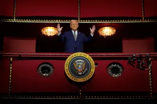 President Donald Trump looks down from the Presidential Box in the Opera House at the John F. Kennedy Center for the Performing Arts as he participates in a guided tour and leads a board meeting on March 17, 2025 in Washington, DC. (Photo by Chip Somodevilla/Getty Images)