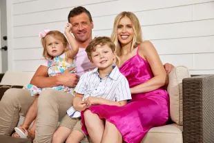 Portrait of USA Ryan Lochte with Kayla, daughter Liv and son Caiden at home during photo shoot.Gainesville (Image via Getty)