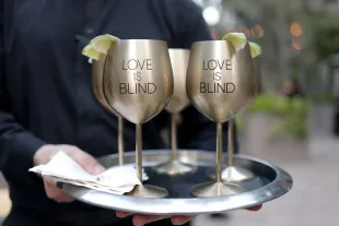 LOS ANGELES, CALIFORNIA - MAY 30: Love Is Blind branding is seen during Netflix's Tudum LIVE 2025: The Night Before Creator Party at Vibiana on May 30, 2025 in Los Angeles, California.  (Photo by Matt Winkelmeyer/Getty Images for Netflix)