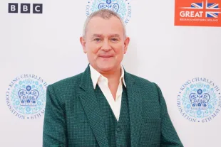 Hugh Bonneville backstage at the Coronation Concert held in the grounds of Windsor Castle on May 7, 2023 in Windsor, England. The Windsor Castle Concert is part of the celebrations of the Coronation of Charles III and his wife, Camilla, as King and Queen of the United Kingdom of Great Britain and Northern Ireland, and the other Commonwealth realms that took place at Westminster Abbey yesterday. High-profile performers will entertain members of the royal family and 20,000 guests including 10,000 members of the public (Image via Getty)