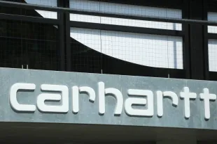 The logo of the U.S.-based apparel company Carhartt, which  was founded in 1889 is seen in Munich. (Photo by Alexander Pohl/NurPhoto via Getty Images)