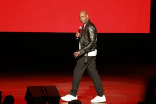NEW YORK, NY - OCTOBER 16: Dave Chappelle performs during a midnight pop-up show at Radio City Music Hall on October 16, 2022 in New York City. (Photo by Jason Mendez/Getty Images for ABA)