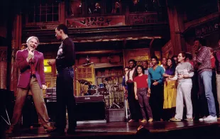 Steve Martin and Eddie Murphy along with various cast members and musician Lionel Richie on Saturday Night Live (Image Via Getty)