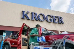 HOUSTON, TEXAS - SEPTEMBER 09: A customer loads his truck after shopping at a Kroger grocery store on September 09, 2022 in Houston, Texas. Kroger stock increased six percent as the company surpassed profit and sales expectations.  (Photo by Brandon Bell/Getty Images)