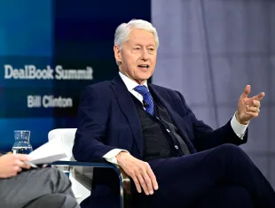 Former President Bill Clinton speaks onstage during The New York Times Dealbook Summit 2024 at Jazz at Lincoln Center on December 04, 2024 in New York City.  (Photo by Eugene Gologursky/Getty Images for The New York Times)
