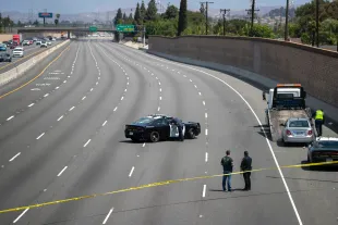 Crime scene investigators investigate the scene (Getty Images)
